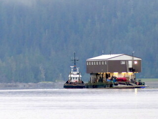 Logging camp under tow in Johnstone Strait